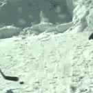 Kid knocks beer can off friend's head with hockey puck