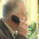 Old man holding the microphone