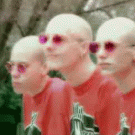 Bald men dancing