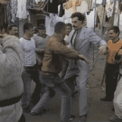 Borat dancing with his fellow Kazakhstanians