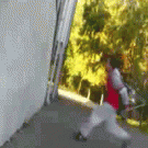 Wall backfilp sitting on a chair