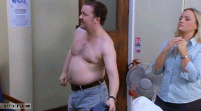 1359403521_ricky_gervais_belly_pull__the_office.gif