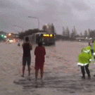 Car suddenly comes out of flood sea foam