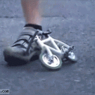 Riding tiny bike
