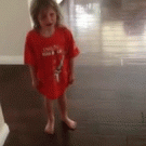 Unhappy girl accidentally walks into wall