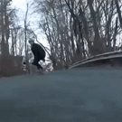 Skateboarder almost hit by a car