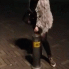 Girl makes pole disappear