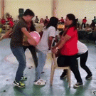 Kids playing balloon game