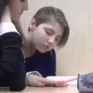 Girl falling asleep in class