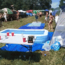 Giy on slip 'n slide hits table with face