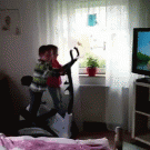 Twins working out while watching cartoons