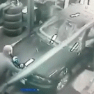Auto technician falls in hole