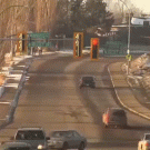 Crossting street on a snowmobile