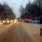 Driver repeatedly slips on busy road