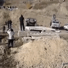 Cameraman gets run over by jeep walks away