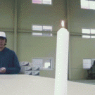 Putting out candle with playing card