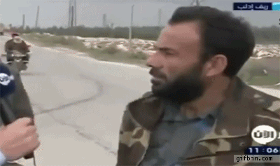1362076249_accident_behind_interview_in_syria.gif