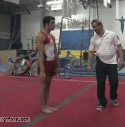 http://www.gifbin.com/bin/022014/1392319426_gymnast_does_a_backflip_without_jumping.gif