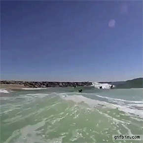 1427134118_wave_throws_boadyboarder_in_the_air.gif