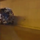Wrecked bus drives down the highway