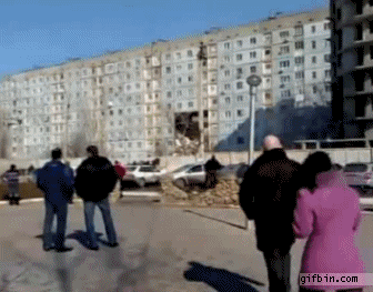 1333652083_apartment_building_collapses.