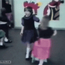 Girls play sit down game