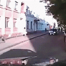 Man kicking windshield