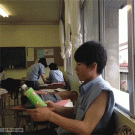 Japanese kid throws bottle out of window