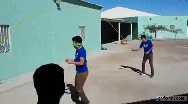 Blindfolded guy jumps rop