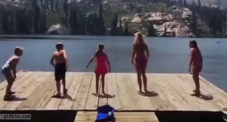girl-pranks-her-friends-jumping-off-dock