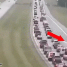 Guy drives in reverse to get off highway