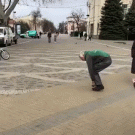 Old man rides tiny bike