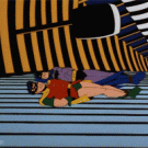 Batman and robin rolling inside a piano