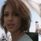Jessica Alba biting the camera