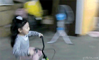 Little girl parking bike