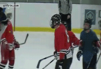 1303406758_hockey-player-gets-hit-in-the
