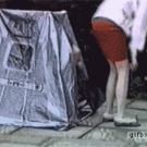 People coming out of tent