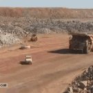 Huge truck goes over smaller truck
