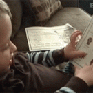 Kid picks nose and shows booger