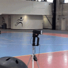 BMX rider jumps over 2 people