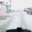 Girl wearing headscarf bangs head into car