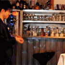 Pulling table cloth from underneath glasses with yo-yo