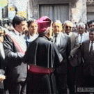 Priest confuses mic for aspergillum