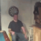 Guy gets struck with dart in forehead