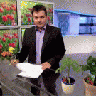 News station worker smoothly gets out of the picture