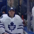 Hockey player accidentally spits on crew member