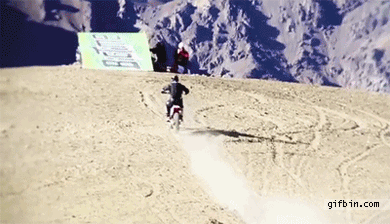 Biker jumps off mountain