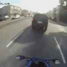 Biker gets hit from behind