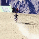 Biker jumps off mountain