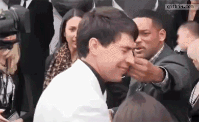 http://www.gifbin.com/bin/052012/1337623423_will_smith_slaps_reporter_for_trying_to_kiss_him.gif